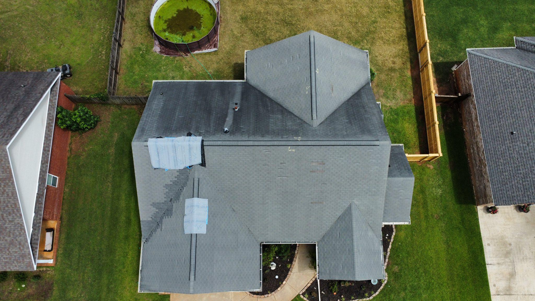 Roof before restoration — storm damage