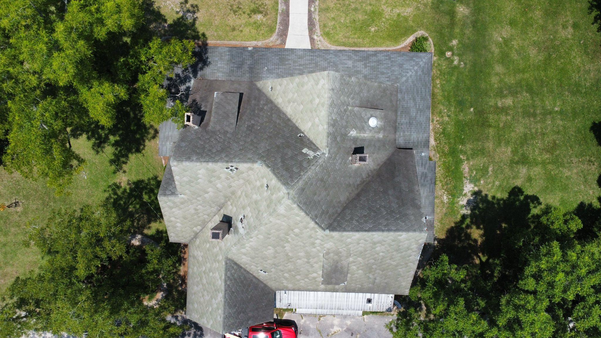 Roof before restoration — hail damage