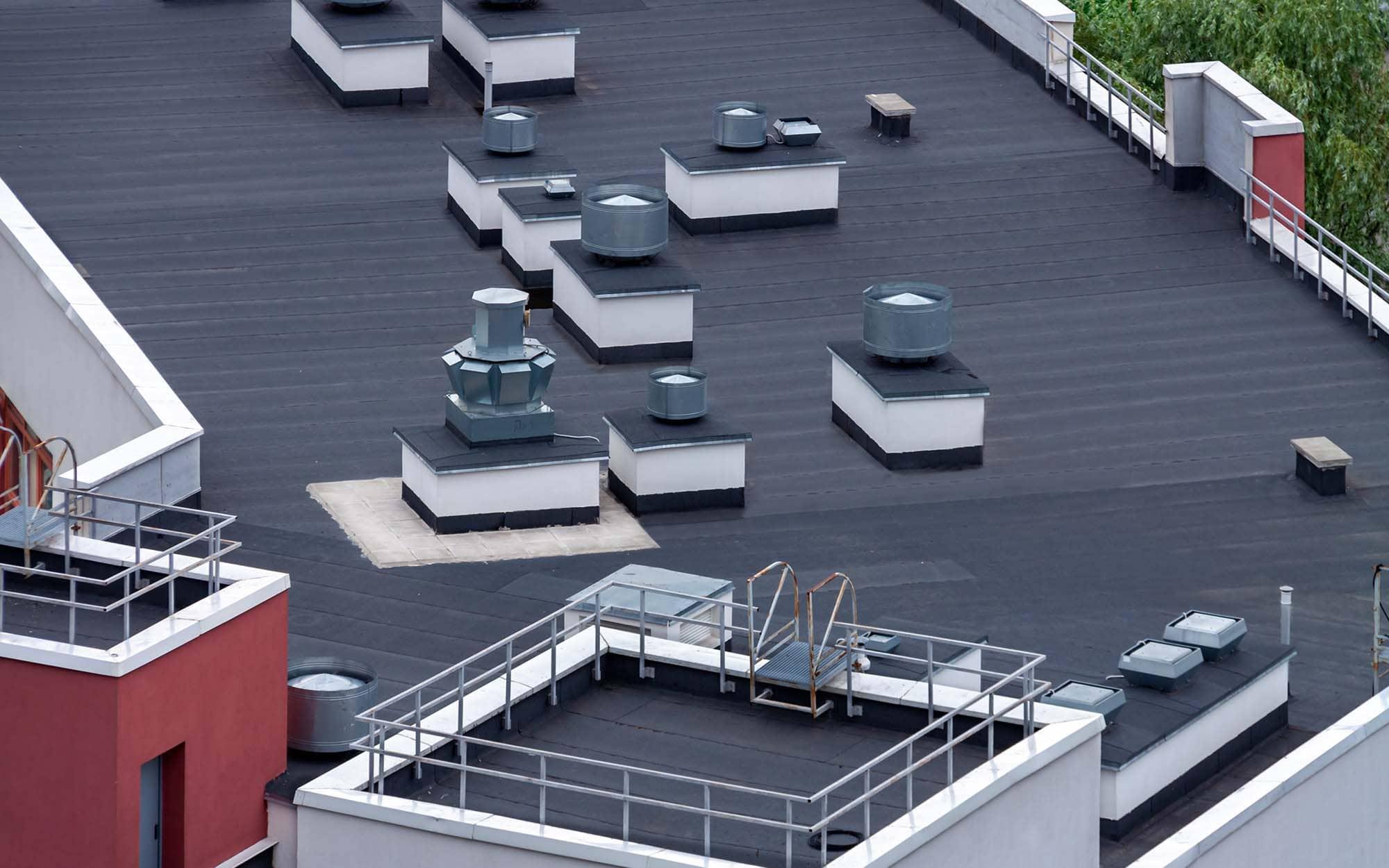 Overhead view of commercial roof coating application